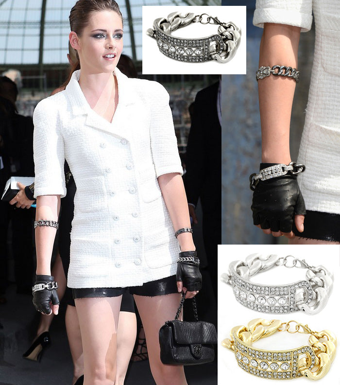 Silver and gold chunky cuban link bracelets with crystal embellishments by House of Zalex, styled with a white tweed blazer and leather gloves.