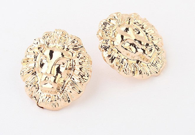 Gold lion head earrings by House of Zalex featuring bold animal-inspired statement jewelry design